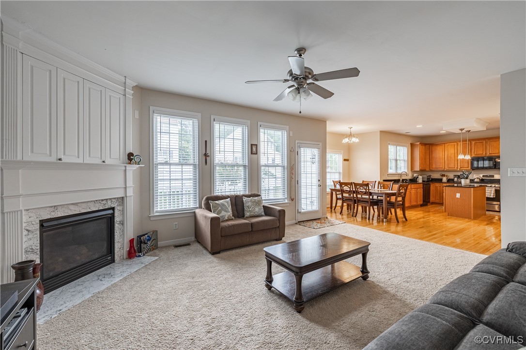 9500 Meadowview Road Henrico, VA 23294 - Photo 14 of 49 a living room with furniture and a fireplace