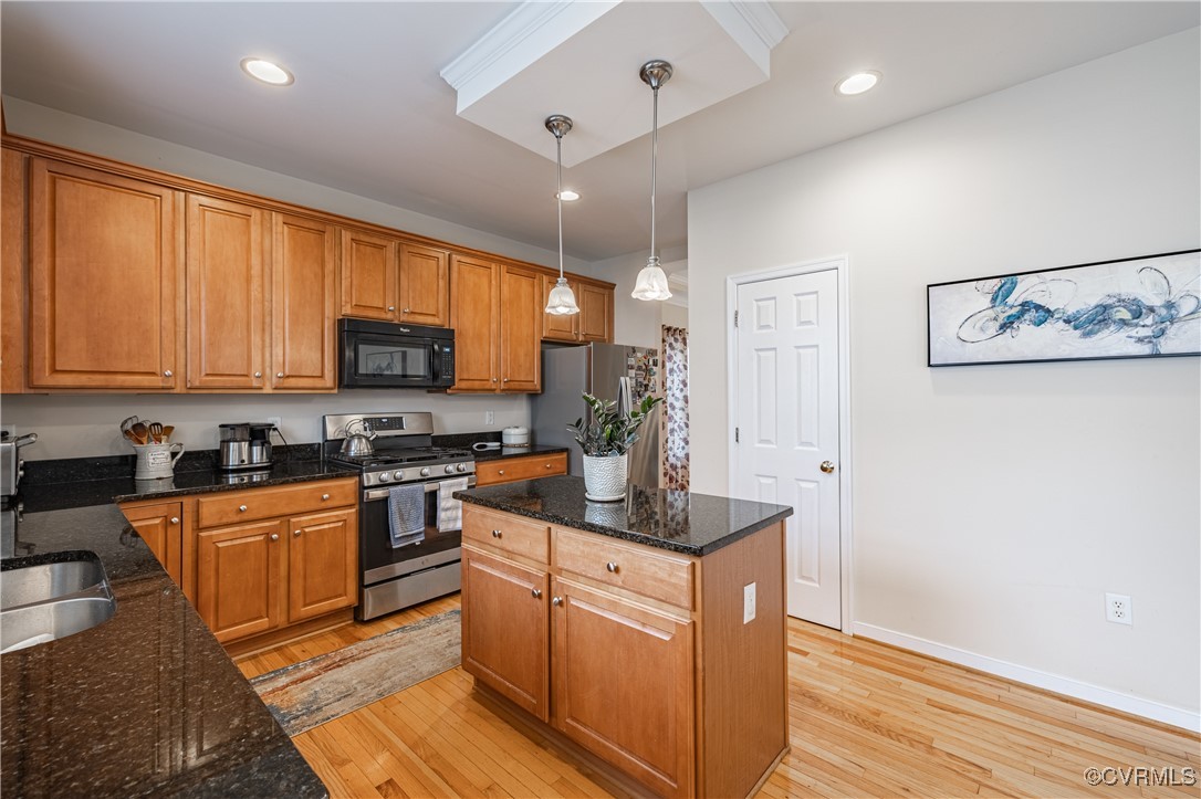 9500 Meadowview Road Henrico, VA 23294 - Photo 22 of 49 a kitchen with stainless steel appliances granite countertop a sink stove and microwave