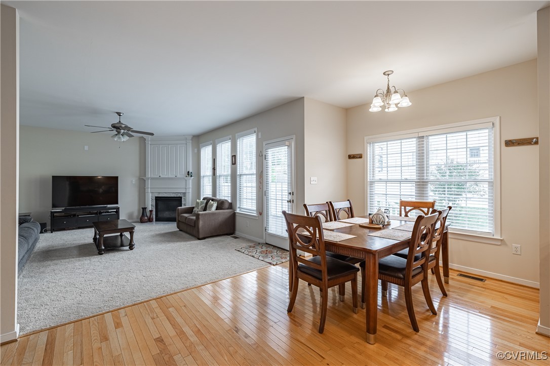 9500 Meadowview Road Henrico, VA 23294 - Photo 24 of 49 a view of a dining room with furniture window and wooden floor