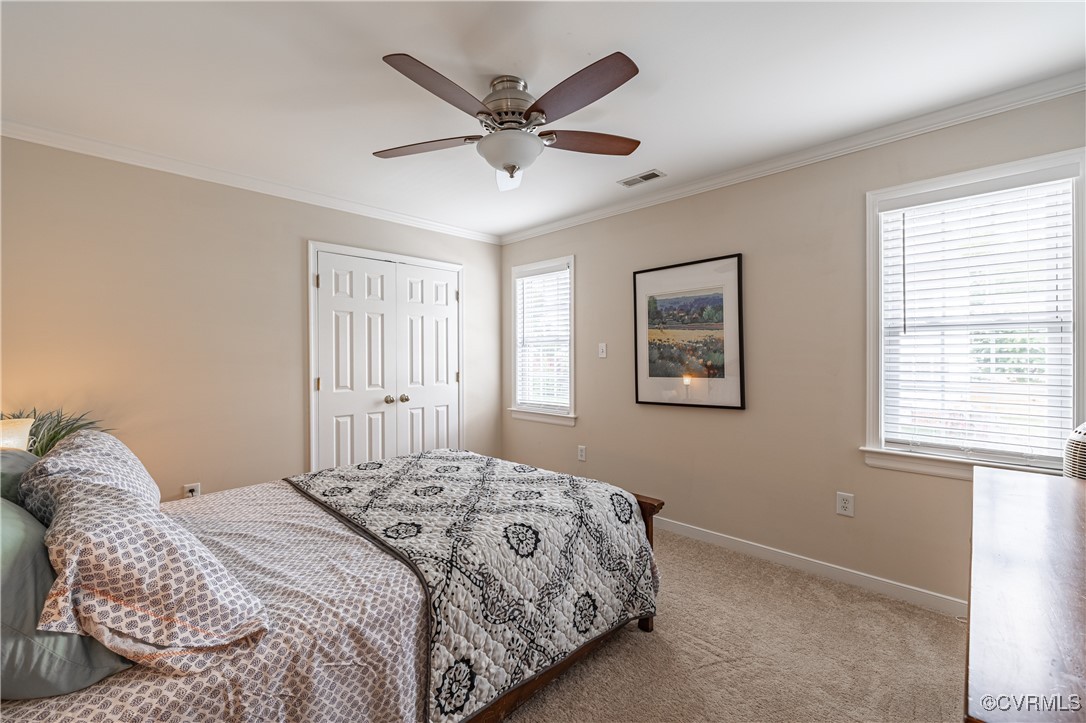 9500 Meadowview Road Henrico, VA 23294 - Photo 33 of 49 a bedroom with a large bed and a window