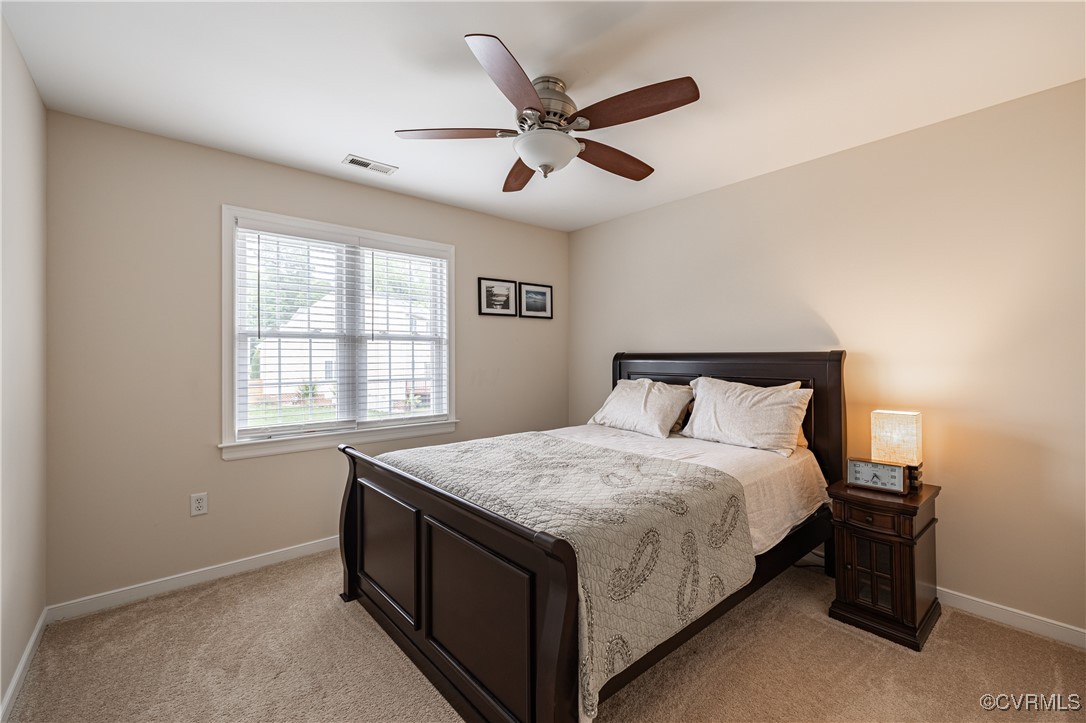 9500 Meadowview Road Henrico, VA 23294 - Photo 34 of 49 a bedroom with a bed and window