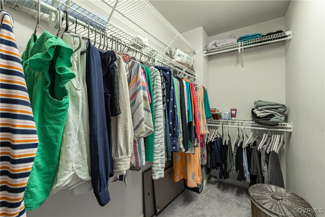 9500 Meadowview Road Henrico, VA 23294 - Photo 44 of 49 a view of walk in closet with clothes and shoes