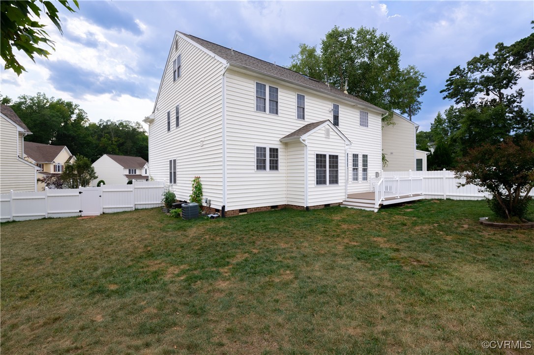 9500 Meadowview Road Henrico, VA 23294 - Photo 10 of 49 a front view of a house with a garden