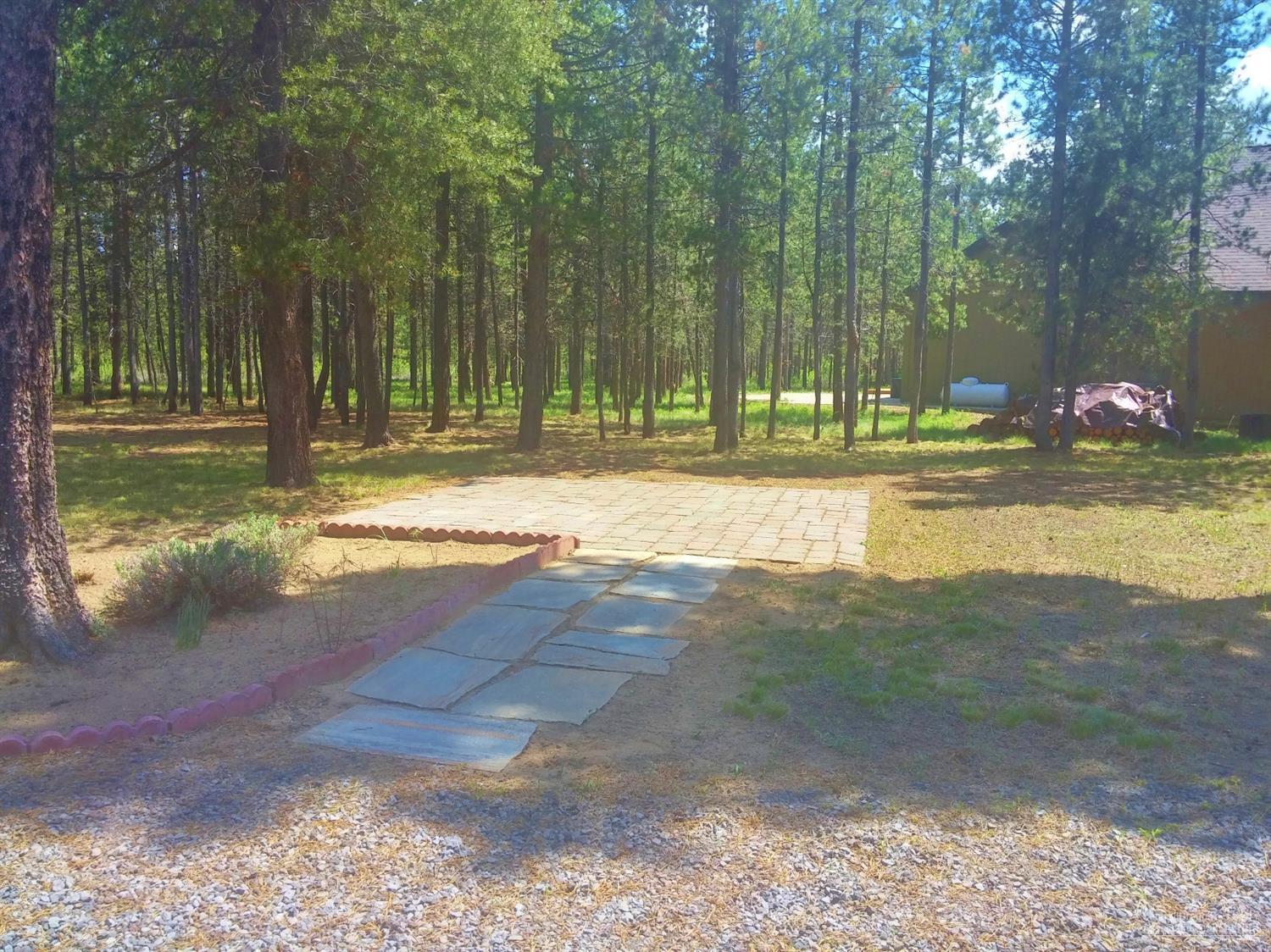56124 Sandpiper Road Bend, OR 97707 - Photo 20 of 25 Original patio area for RV parking South