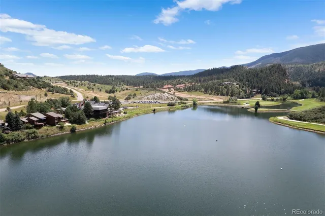 a view of a lake with a mountain