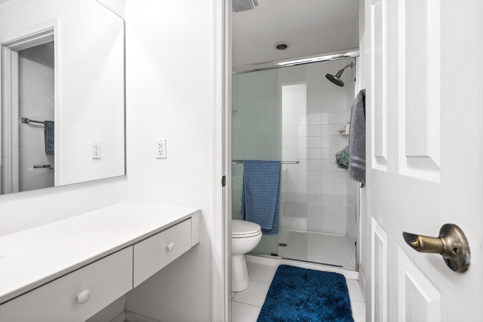 15822 Southwest 10th Street Pembroke Pines, FL 33027 - Photo 25 of 37 a bathroom with a sink a toilet a shower and a mirror