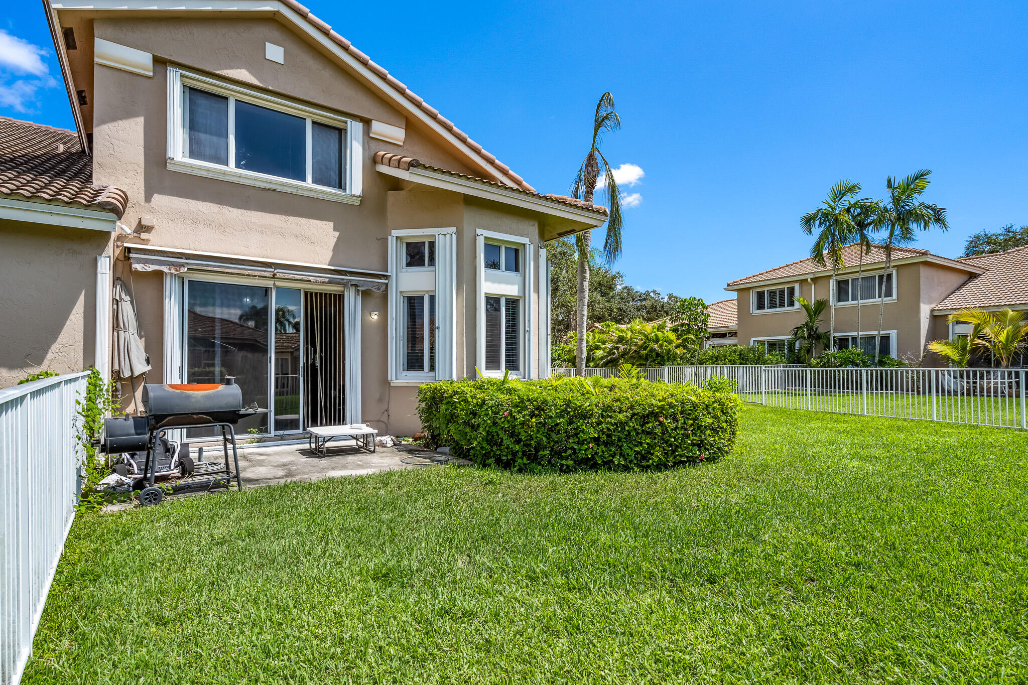 15822 Southwest 10th Street Pembroke Pines, FL 33027 - Photo 30 of 37 a view of an house with backyard porch and sitting area