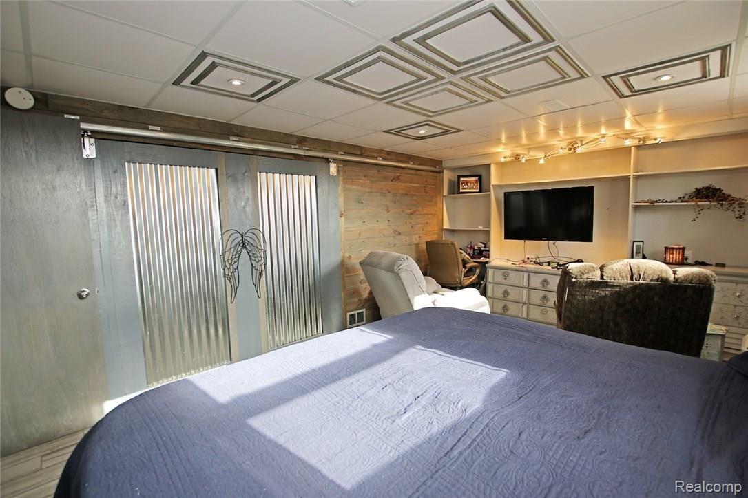 9488 Hegel Road Goodrich, MI 48438 - Photo 26 of 42 26) Lower Level Bedroom.jpg