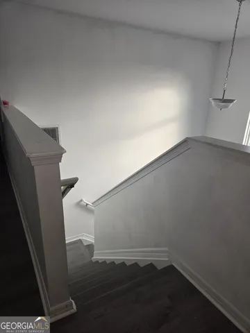 a view of backyard with seating area and green space