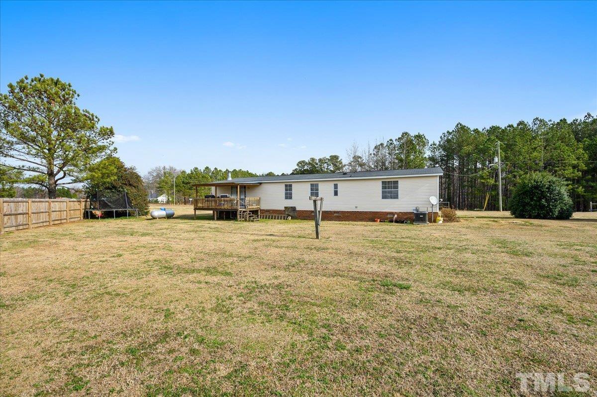 6604 Stokes Road Middlesex, NC 27557 - Photo 15 of 15 a view of a house with a outdoor space