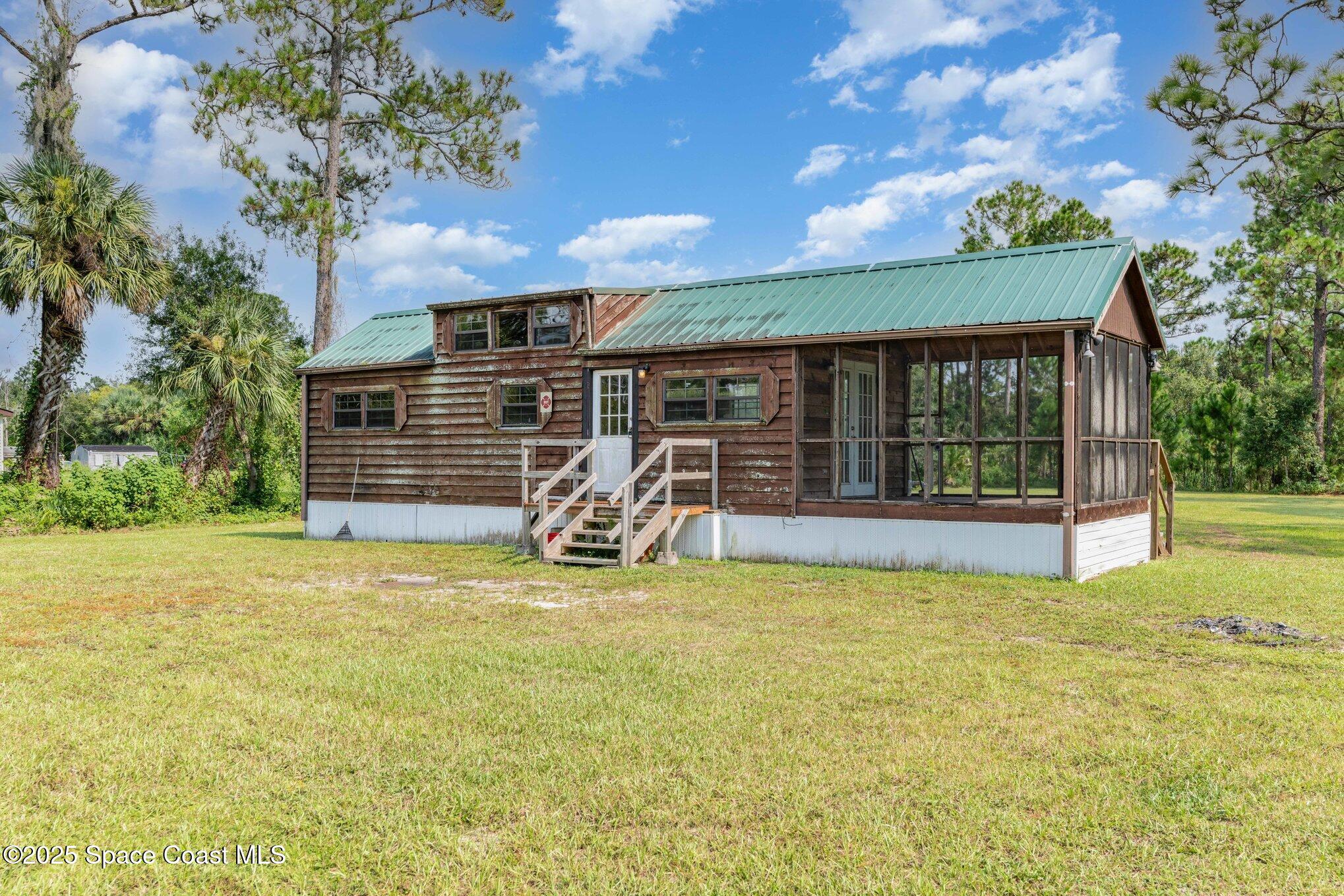 4775 Pine Needle Road Mims, FL 32754 - Photo 2 of 17 001_dsc00147-edit_663