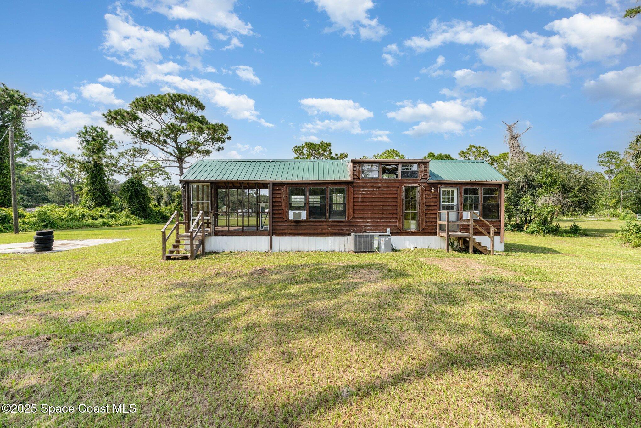 4775 Pine Needle Road Mims, FL 32754 - Photo 3 of 17 012_dsc00145-edit_634