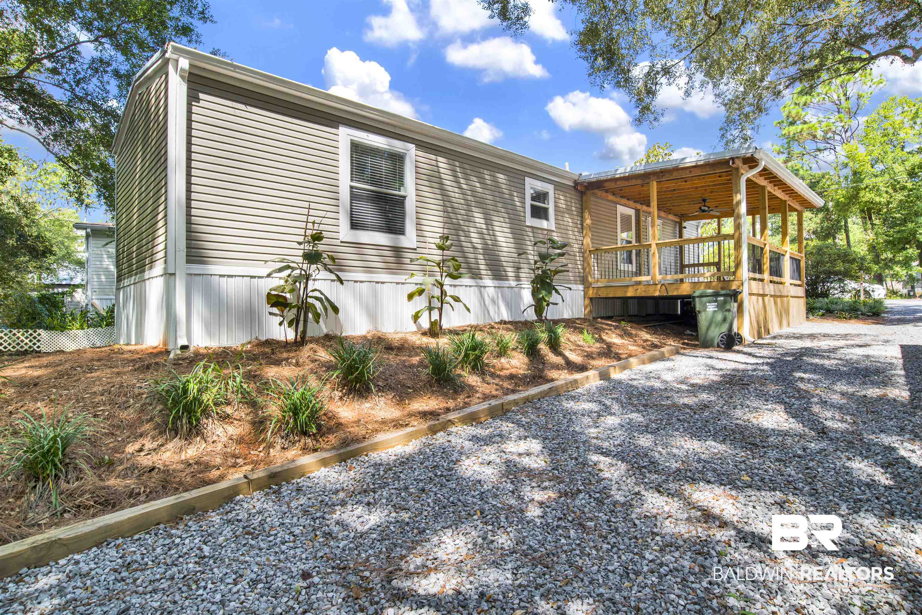 1411 Ridgewood Drive Lillian, AL 36549 - Photo 6 of 30 Exterior space featuring a wooden deck