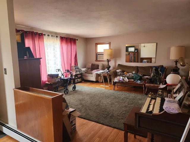 a room with furniture and a window