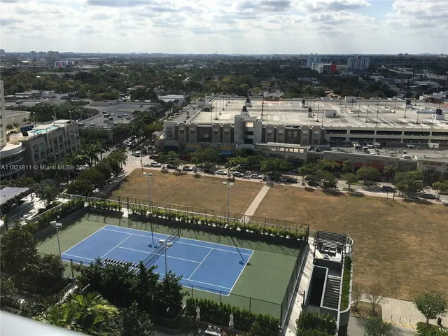 a bathroom with a toilet and shower