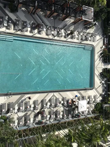 a outdoor space with furniture and view of living room