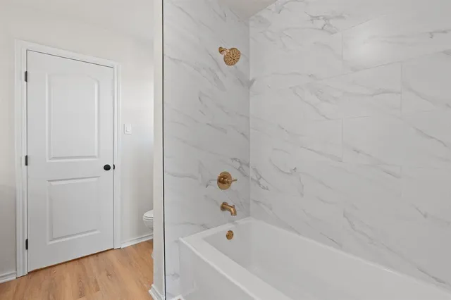 a bathroom with a bathtub