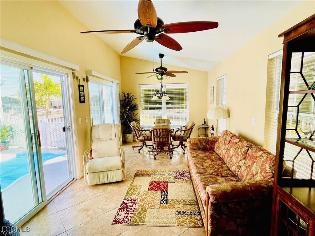 3064 Sloop Lane St. James City, FL 33956 - Photo 25 of 30 a living room with furniture and a large window