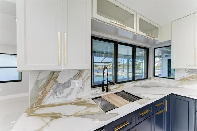 a bathroom with a sink mirror toilet and bathtub