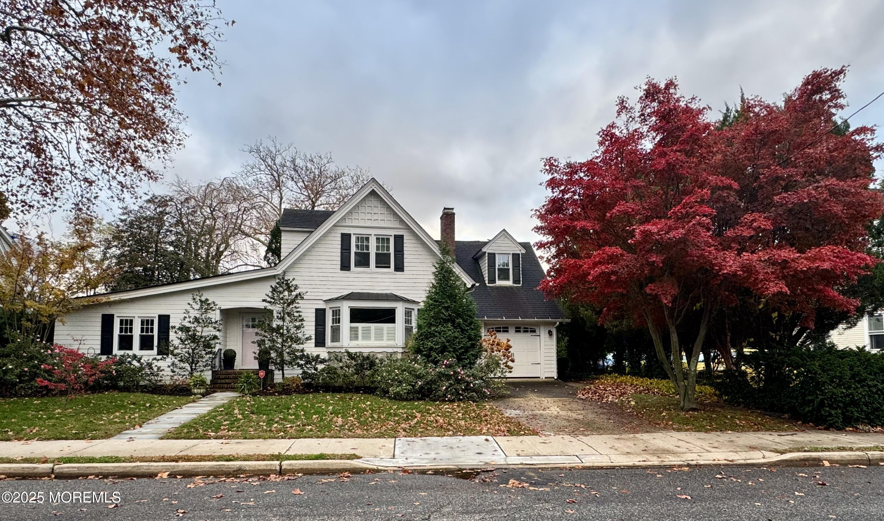 59 Leroy Place Red Bank, NJ 07701 - Photo 1 of 37 a front view of a house with a yard