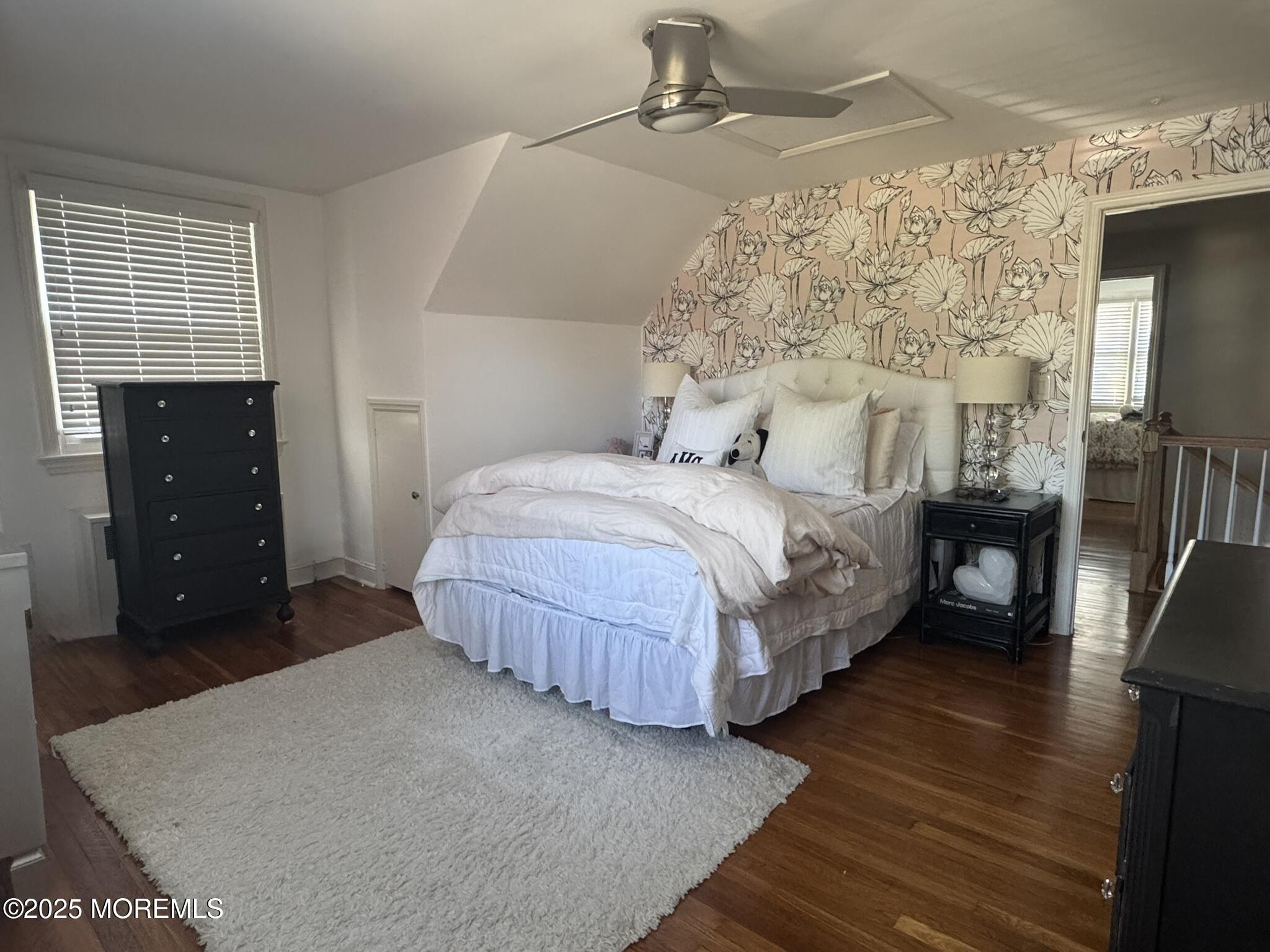 59 Leroy Place Red Bank, NJ 07701 - Photo 21 of 37 a bedroom with a bed and a mirror