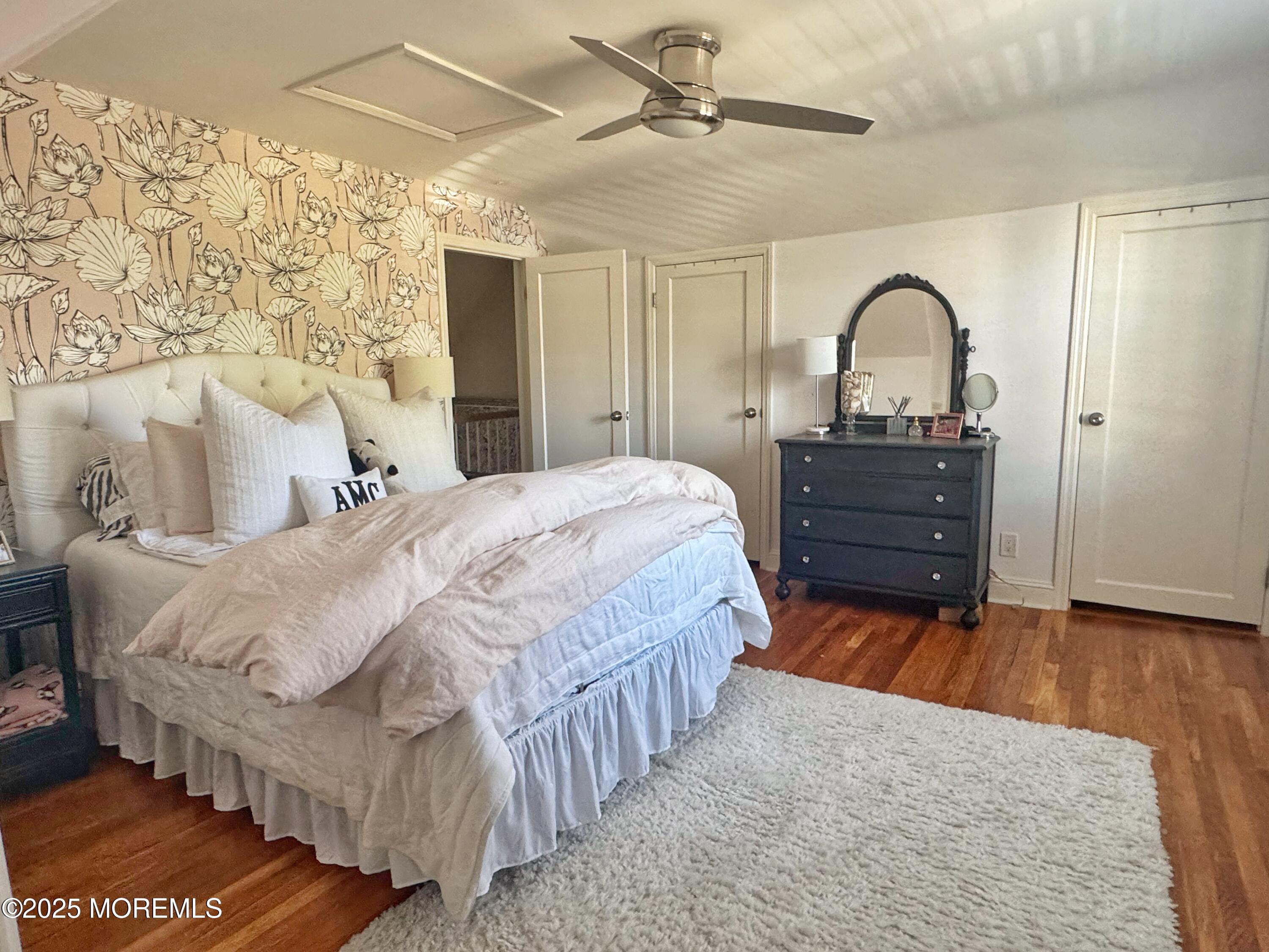 59 Leroy Place Red Bank, NJ 07701 - Photo 22 of 37 a bedroom with a bed and a dresser