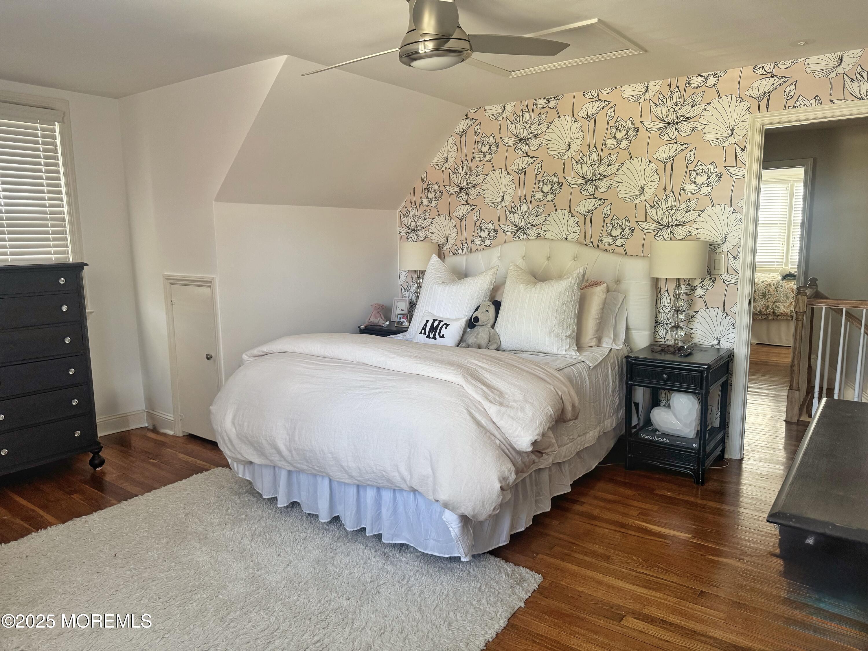 59 Leroy Place Red Bank, NJ 07701 - Photo 23 of 37 a bedroom with a bed and wooden floor