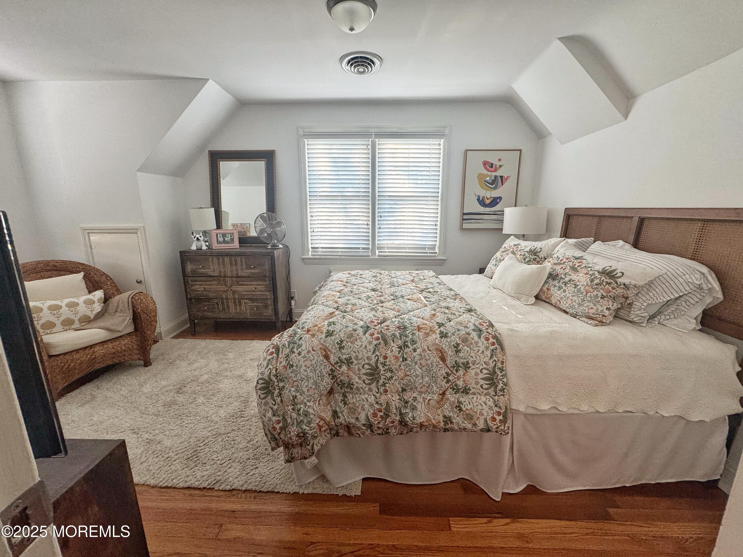 59 Leroy Place Red Bank, NJ 07701 - Photo 26 of 37 a bedroom with a bed and wooden floor