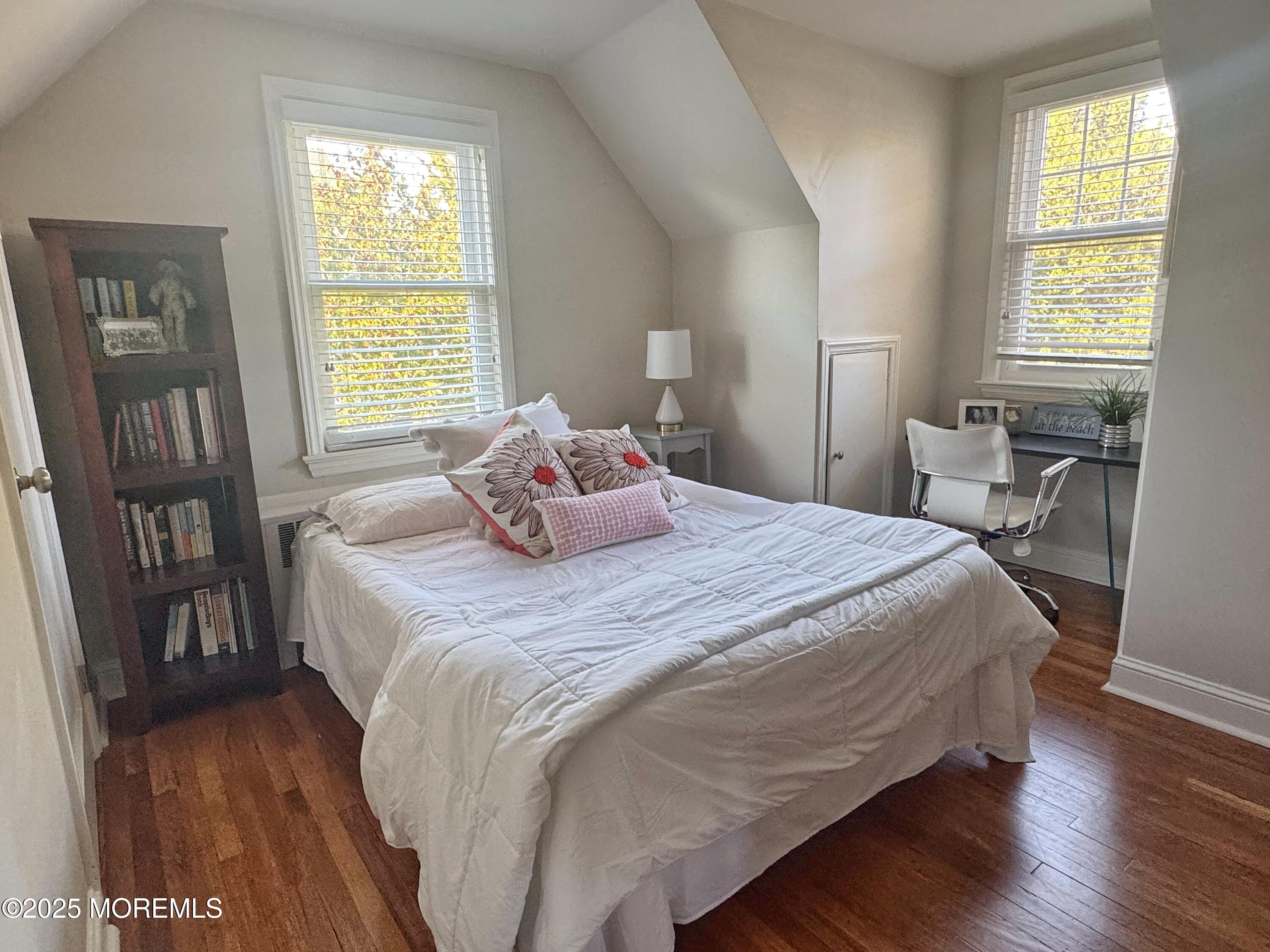 59 Leroy Place Red Bank, NJ 07701 - Photo 28 of 37 a bedroom with a bed and wooden floor