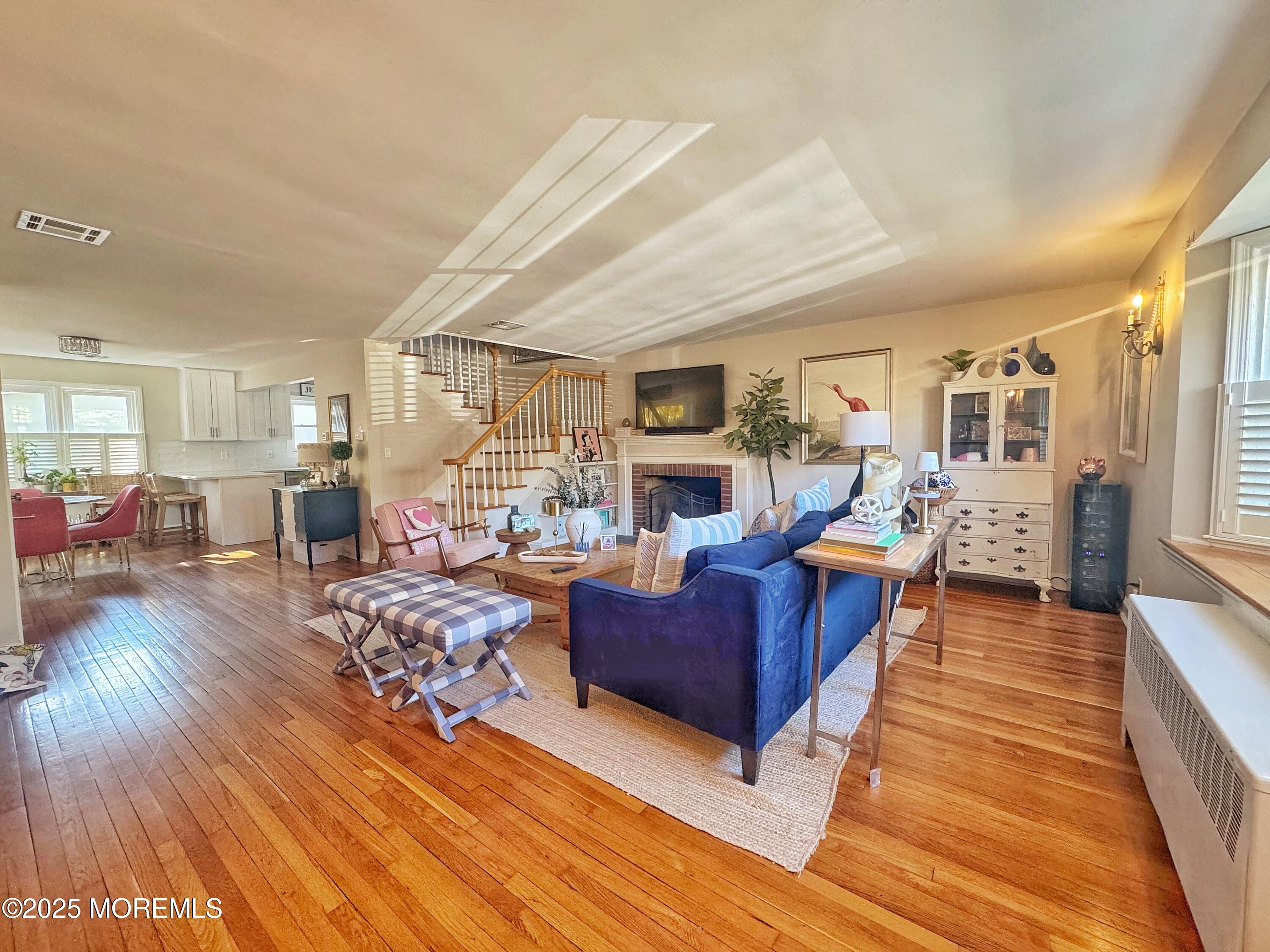 59 Leroy Place Red Bank, NJ 07701 - Photo 4 of 37 a living room with furniture and a wooden floor