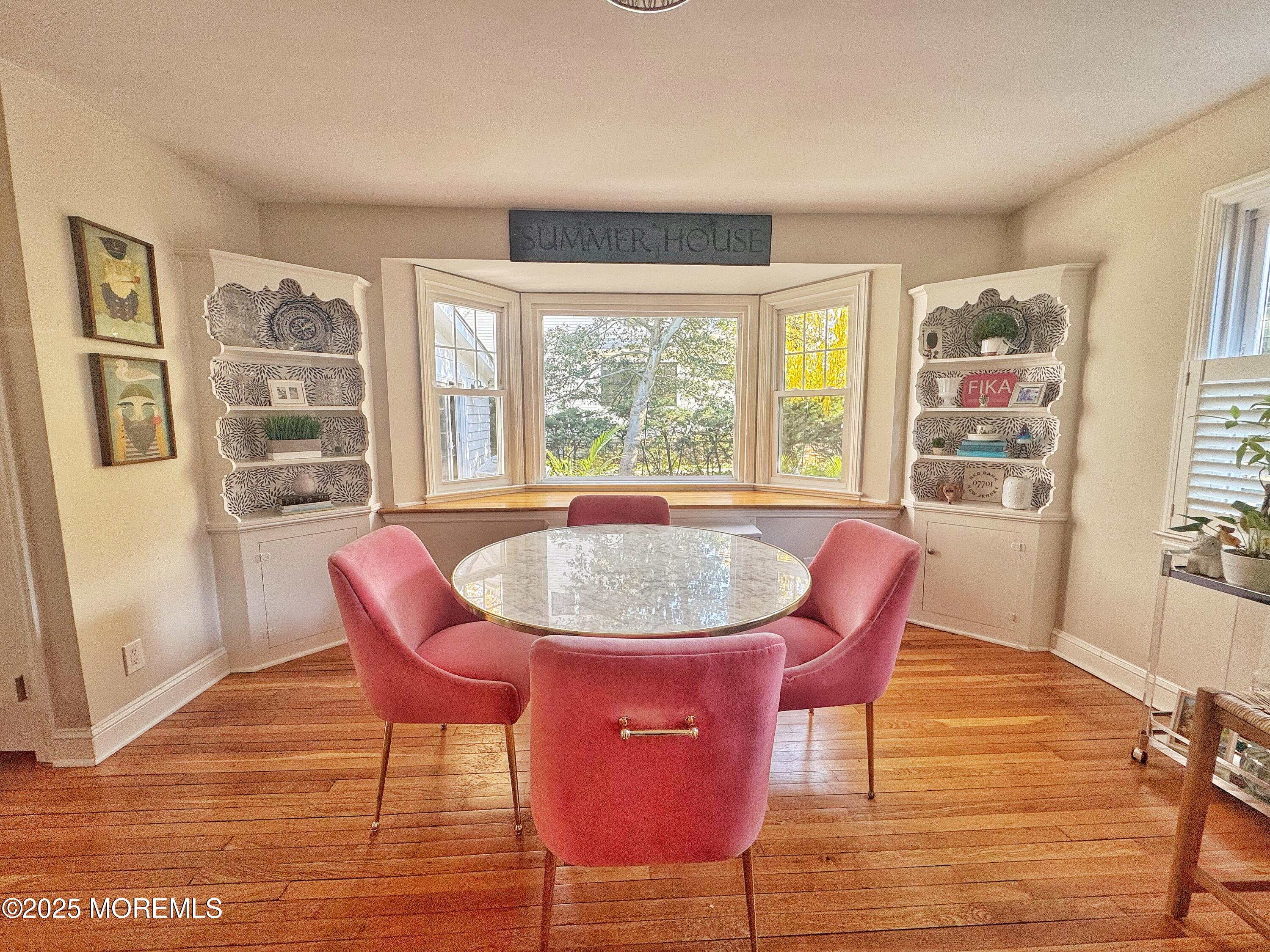 59 Leroy Place Red Bank, NJ 07701 - Photo 9 of 37 a view of a dining room with furniture window and wooden floor