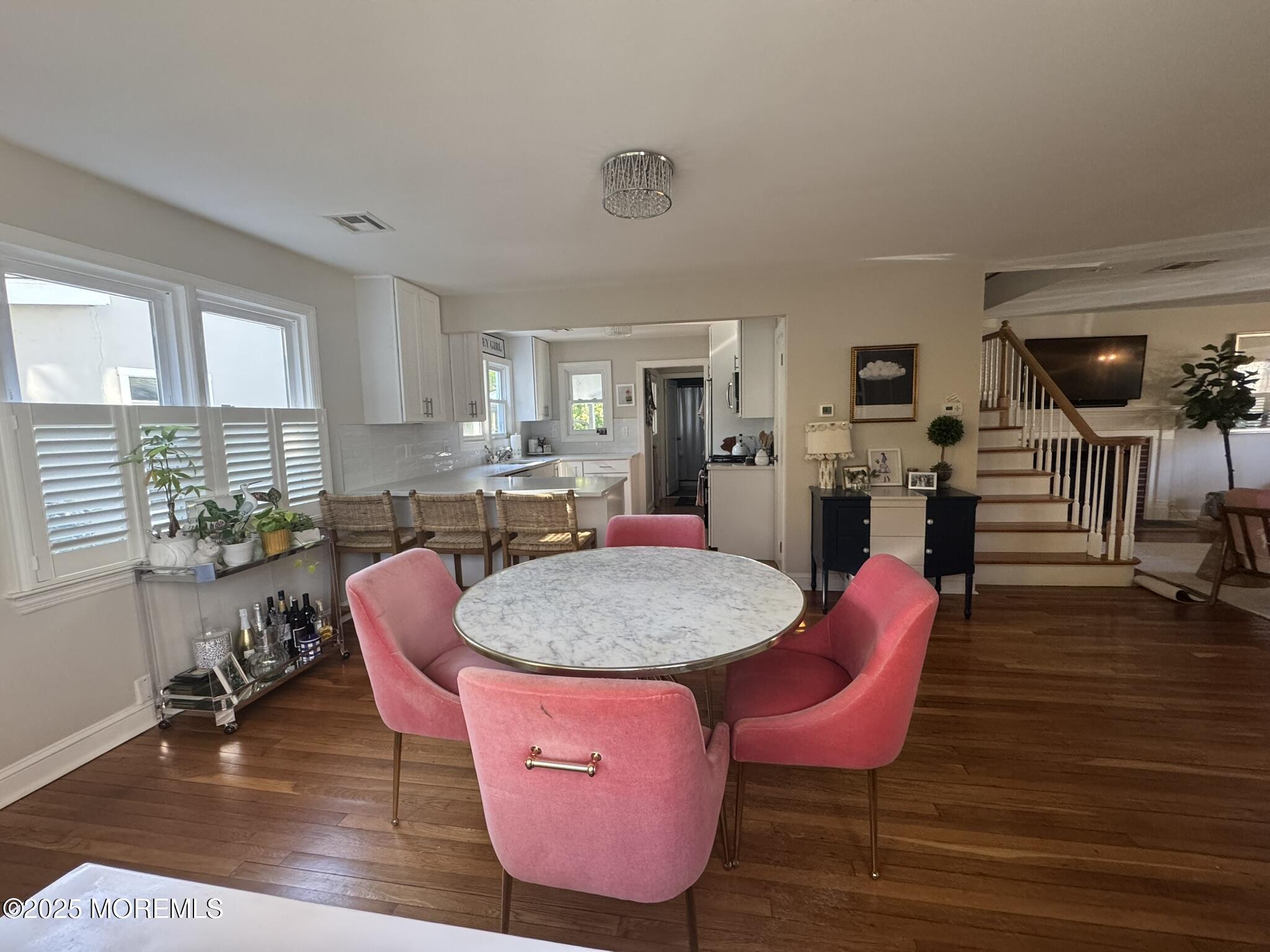 59 Leroy Place Red Bank, NJ 07701 - Photo 10 of 37 a dining room with furniture and wooden floor