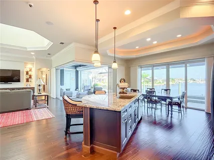 a view of a dining area with furniture window and wooden floor