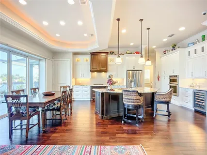 a work room with furniture and wooden floor