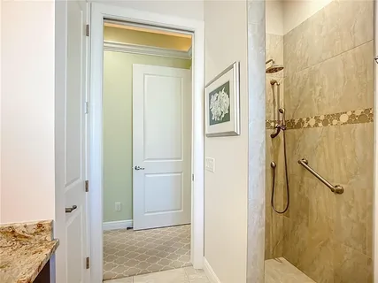 a utility room with a sink washer and dryer