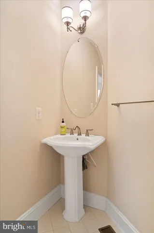 a bedroom with a large bed and a flat screen tv