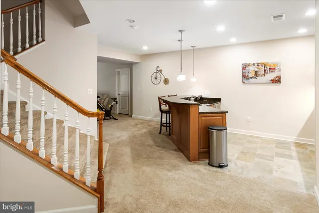 an aerial view of a house with outdoor space