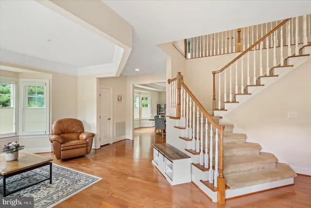 a view of dining room with furniture and wooden floor