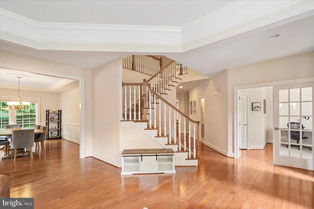 a living room with furniture rug and window