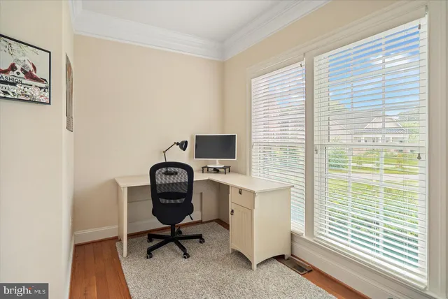 a kitchen with granite countertop a stove and a sink