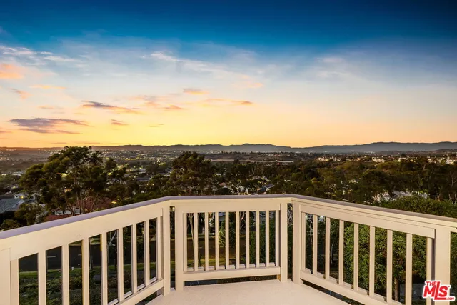 a view of a balcony with outdoor space