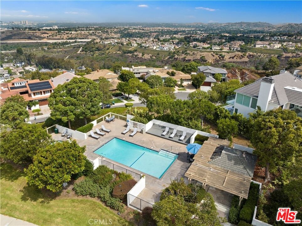 31 St Tropez Newport Beach, CA 92660 - Photo 20 of 22 an aerial view of a house with a lake view