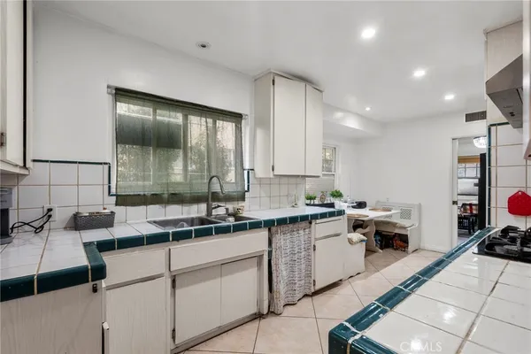 $910,000 | 9253 Hayvenhurst Avenue, North Hills, CA 91343