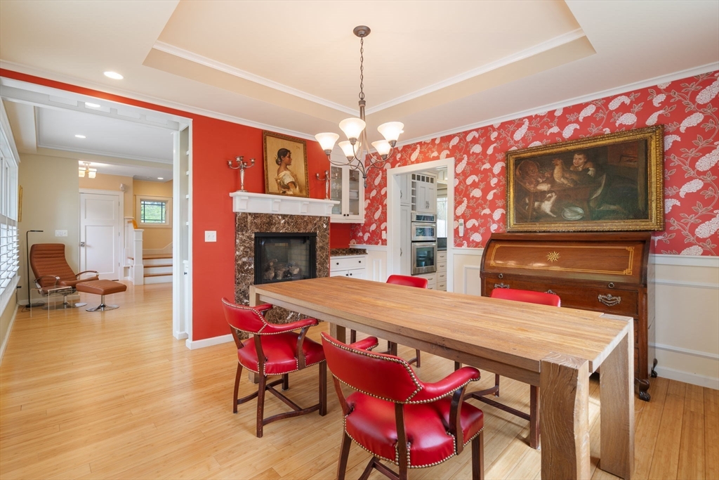51 Avon Road Wellesley, MA 02482 - Photo 11 of 26 a dining room with a table and chairs