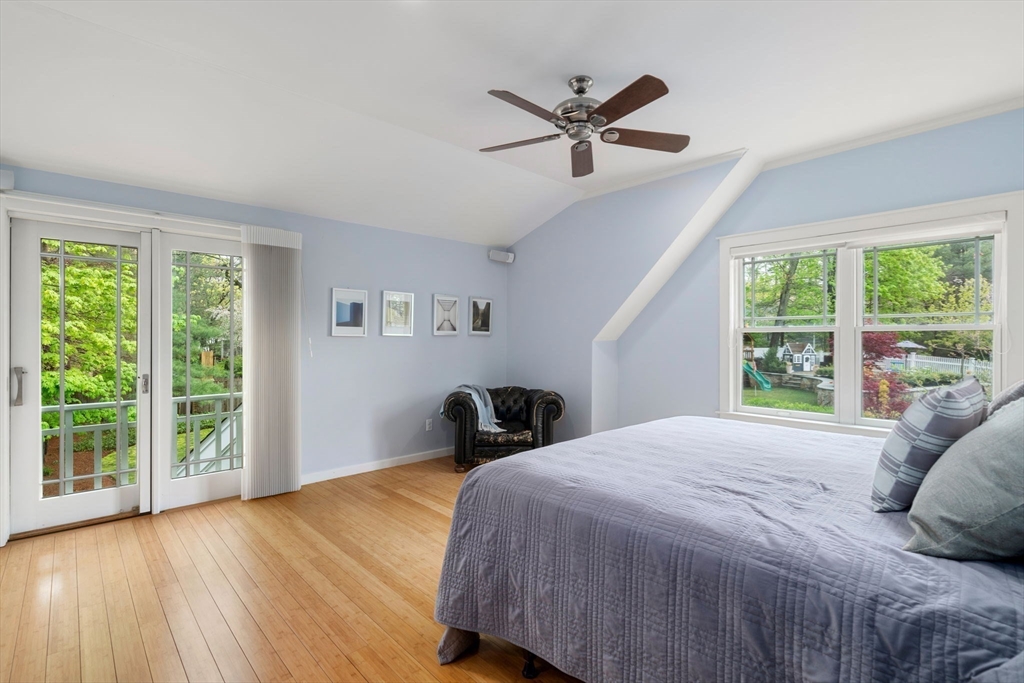 51 Avon Road Wellesley, MA 02482 - Photo 15 of 26 a bedroom with a large bed and a large window