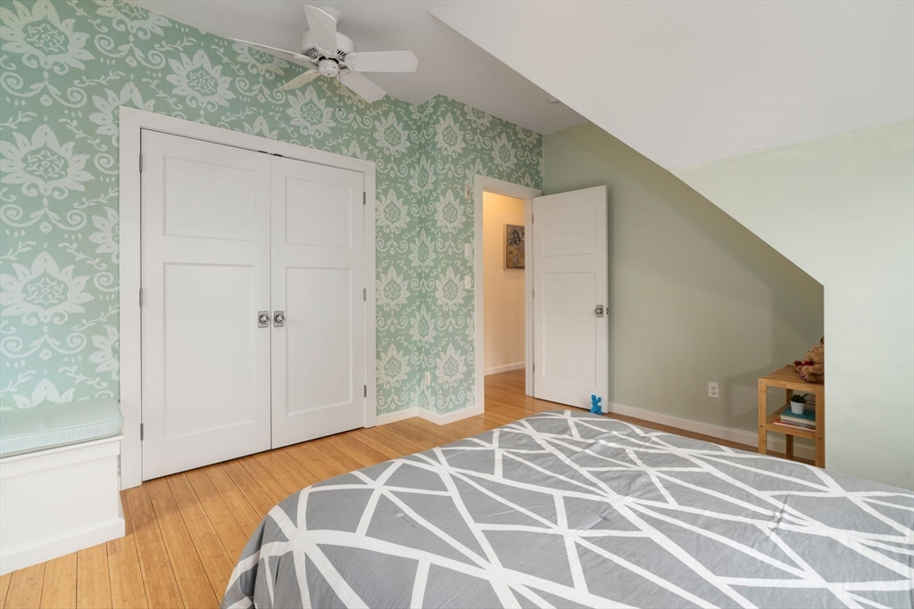 51 Avon Road Wellesley, MA 02482 - Photo 18 of 26 a bedroom with a bed and a window