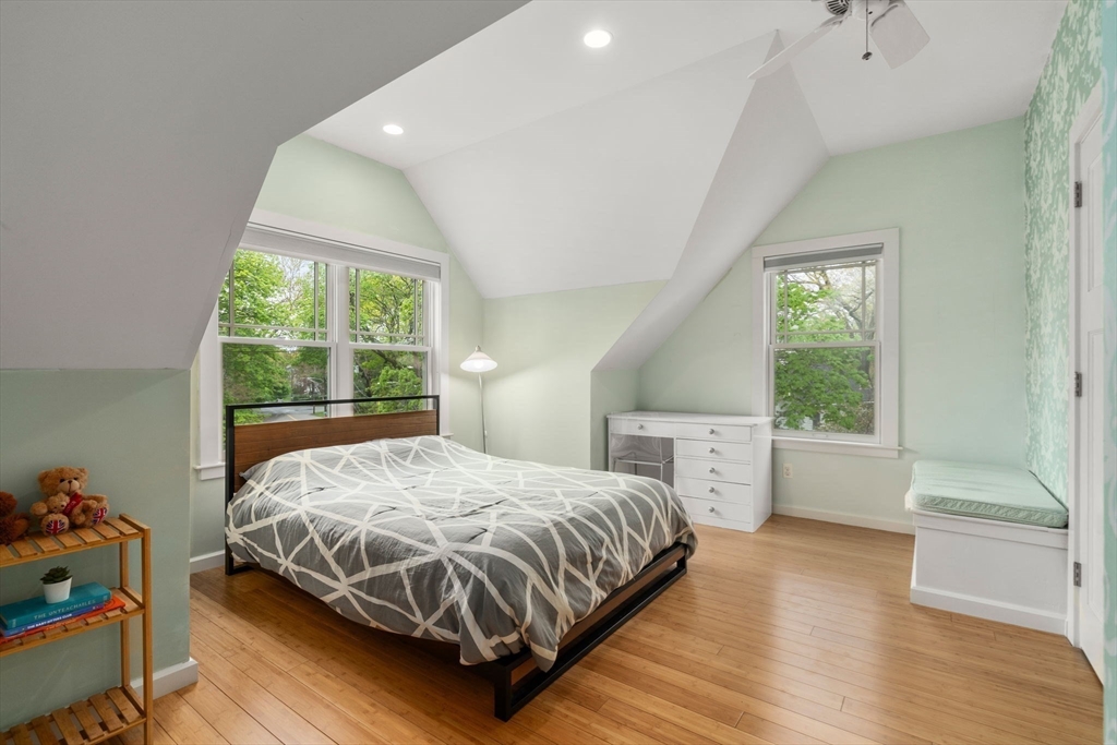 51 Avon Road Wellesley, MA 02482 - Photo 19 of 26 a bedroom with a bed and a window