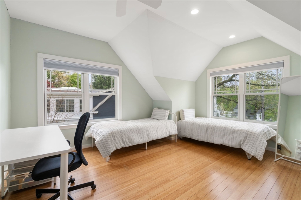 51 Avon Road Wellesley, MA 02482 - Photo 20 of 26 a bedroom with two beds and a large window