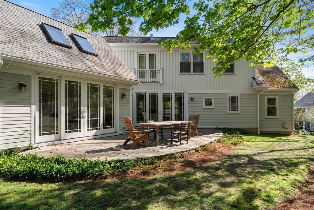 51 Avon Road Wellesley, MA 02482 - Photo 23 of 26 a house view with a garden space