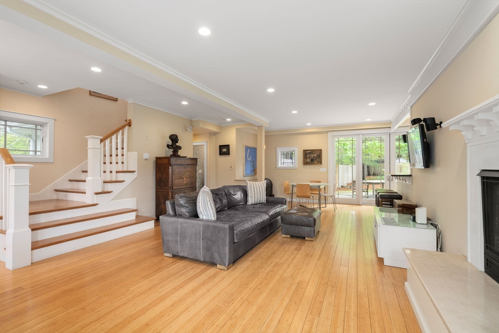 51 Avon Road Wellesley, MA 02482 - Photo 6 of 26 a living room with furniture and a wooden floor